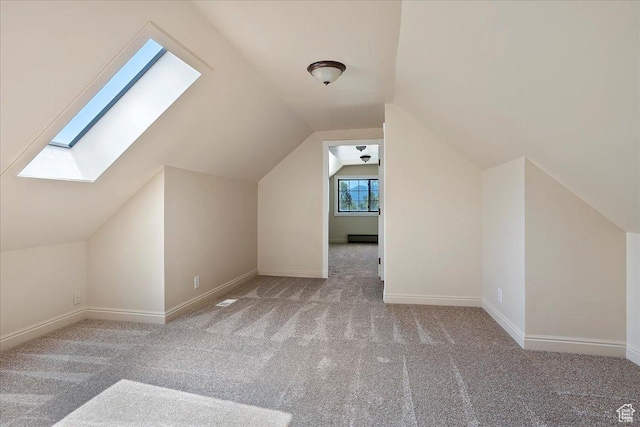 409 N 9000 E, Huntsville, UT 84317 - additional living space featuring a skylight, carpet flooring, and lofted ceiling