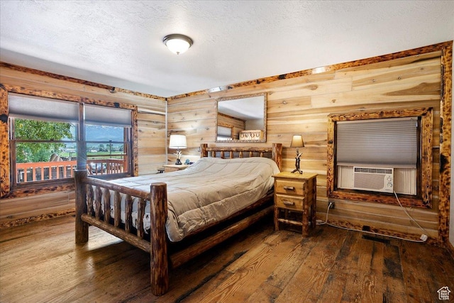 409 N 9000 E, Huntsville, UT 84317 - bedroom featuring hardwood / wood-style flooring, a textured ceiling, and cooling unit
