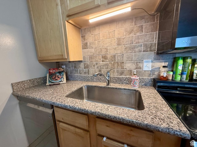 3677 S 2200 W Unit 41, West Valley City, UT 84119 - kitchen featuring stainless steel dishwasher, light brown cabinetry, light stone counters, dishwashing machine, and tasteful backsplash
