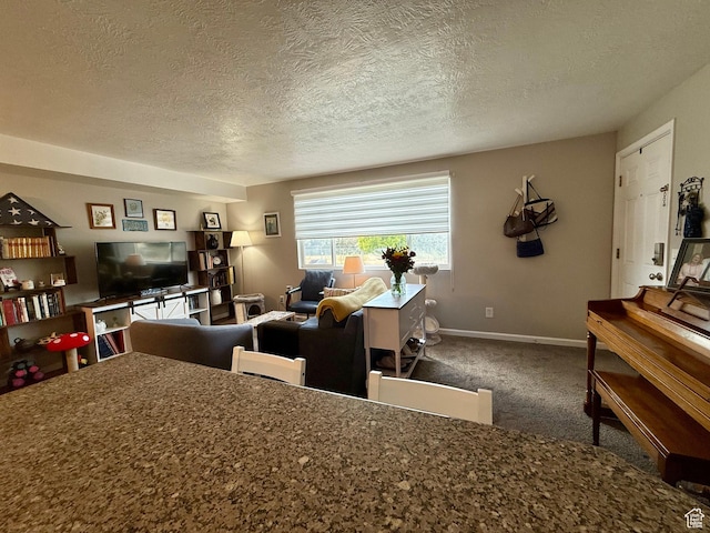 3677 S 2200 W Unit 41, West Valley City, UT 84119 - carpeted dining space with a textured ceiling and baseboards