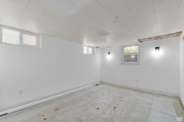 2317 N Timpview Dr E, Provo, UT 84604 - basement with baseboards and a drop ceiling
