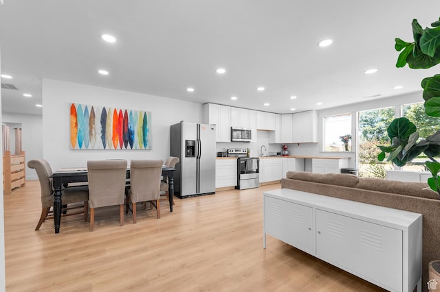 2317 N Timpview Dr E, Provo, UT 84604 - living area featuring recessed lighting and light wood-type flooring