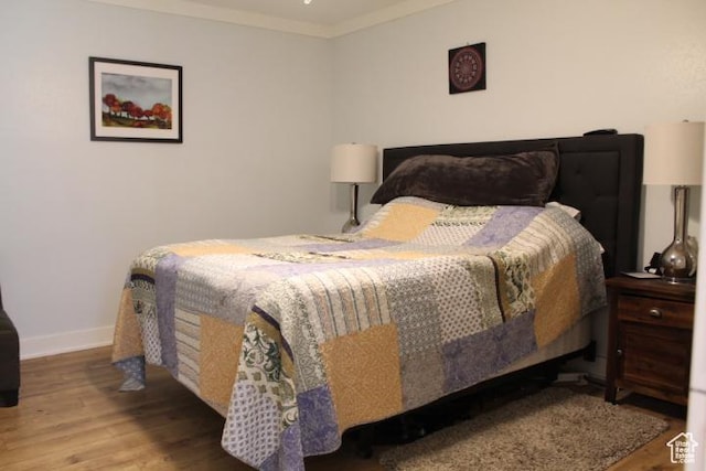 1268 E Edenbrook Dr, Sandy, UT 84094 - bedroom with wood finished floors and crown molding