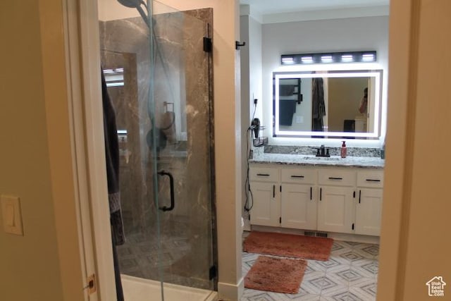 1268 E Edenbrook Dr, Sandy, UT 84094 - bathroom featuring vanity, a stall shower, and crown molding
