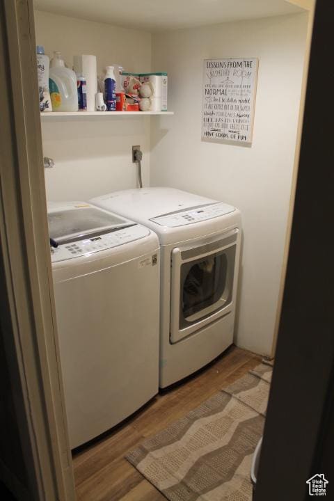 1268 E Edenbrook Dr, Sandy, UT 84094 - washroom featuring separate washer and dryer and wood finished floors