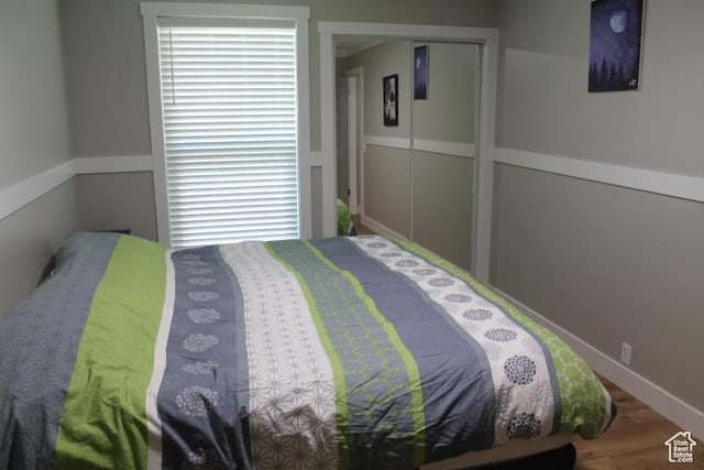 1268 E Edenbrook Dr, Sandy, UT 84094 - bedroom featuring wood finished floors and a closet