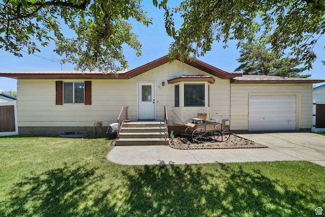 451 S 200 E, Heber City, UT 84032 - ranch-style house with an attached garage, driveway, a front yard, and a metal roof