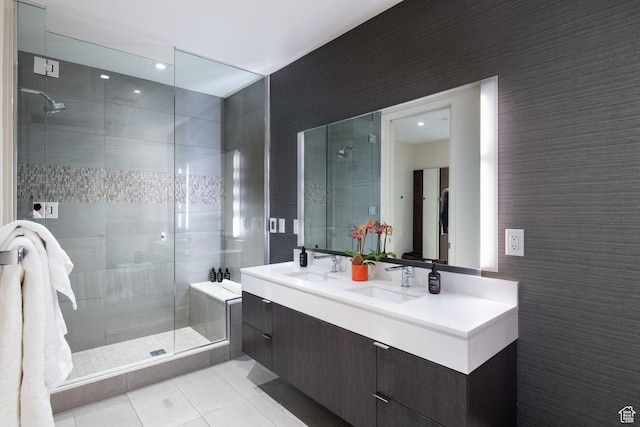 2431 W High Mountain Rd Unit 504, Park City, UT 84098 - bathroom with tile patterned floors, double vanity, and a shower stall