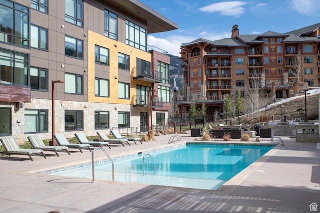 2431 W High Mountain Rd Unit 504, Park City, UT 84098 - community pool featuring a patio