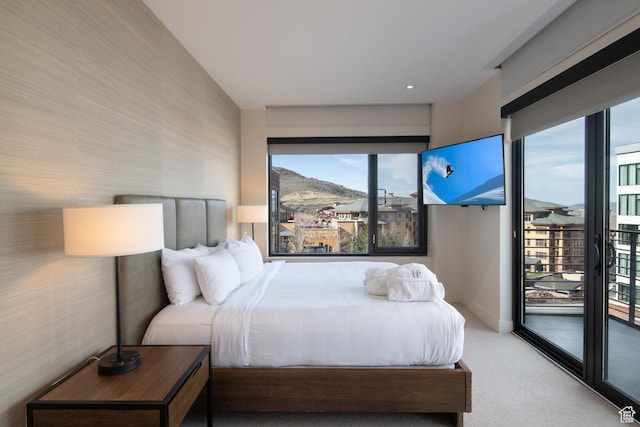 2431 W High Mountain Rd Unit 504, Park City, UT 84098 - carpeted bedroom featuring access to outside and multiple windows