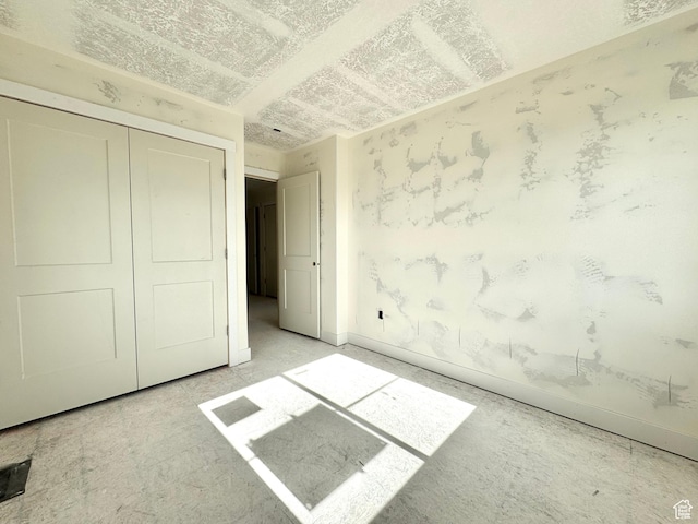 2719 N 2775 W Unit 120, Plain City, UT 84404 - unfurnished bedroom with a closet and baseboards