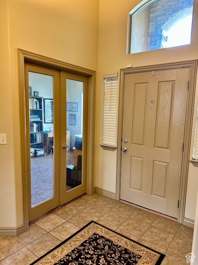 12413 S Andreas St W, Riverton, UT 84065 - entrance foyer with french doors, light tile patterned flooring, and a high ceiling