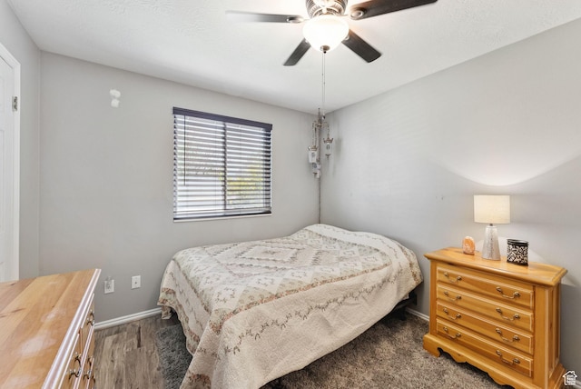 3573 S Deann Dr W, West Valley City, UT 84128 - bedroom featuring wood finished floors and ceiling fan
