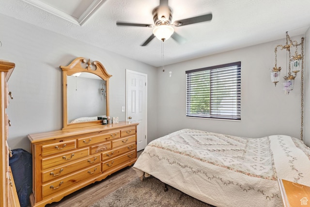3573 S Deann Dr W, West Valley City, UT 84128 - bedroom featuring wood finished floors and a ceiling fan
