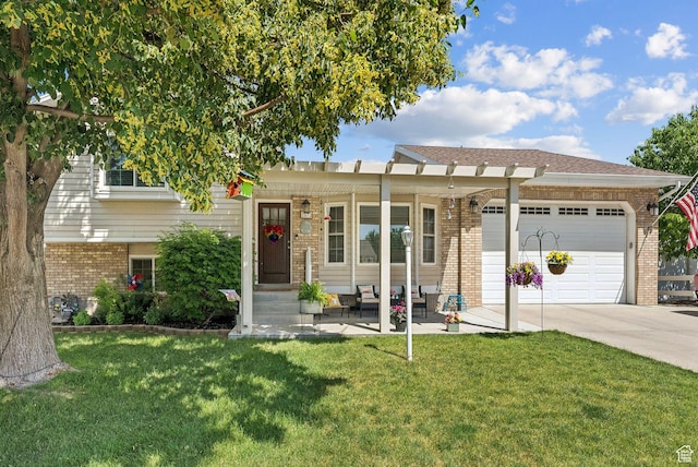 3573 S Deann Dr W, West Valley City, UT 84128 - view of front of property with brick siding, driveway, an attached garage, a front yard, and an outdoor hangout area