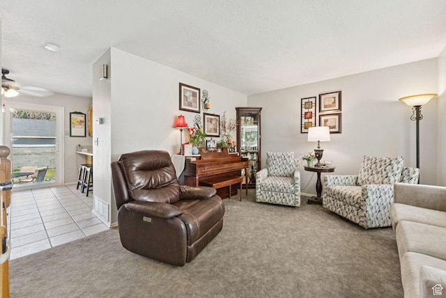 3573 S Deann Dr W, West Valley City, UT 84128 - living area with ceiling fan, carpet floors, and tile patterned flooring