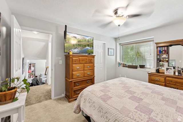 3573 S Deann Dr W, West Valley City, UT 84128 - bedroom featuring light carpet and ceiling fan