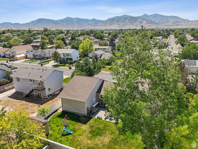 3573 S Deann Dr W, West Valley City, UT 84128 - aerial perspective of suburban area featuring a mountainous background