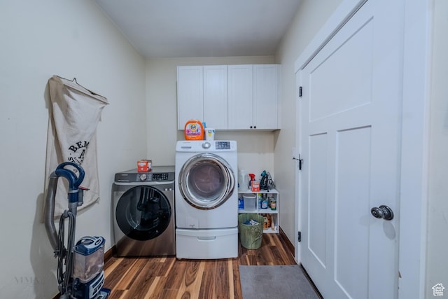 7395 N Johnson Canyon Rd, Kanab, UT 84741 - laundry room with cabinet space, washing machine and clothes dryer, and dark wood-type flooring
