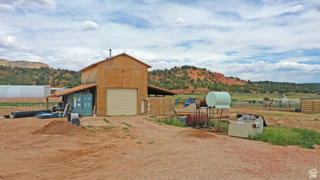 7395 N Johnson Canyon Rd, Kanab, UT 84741 - view of outbuilding featuring a mountain view and driveway