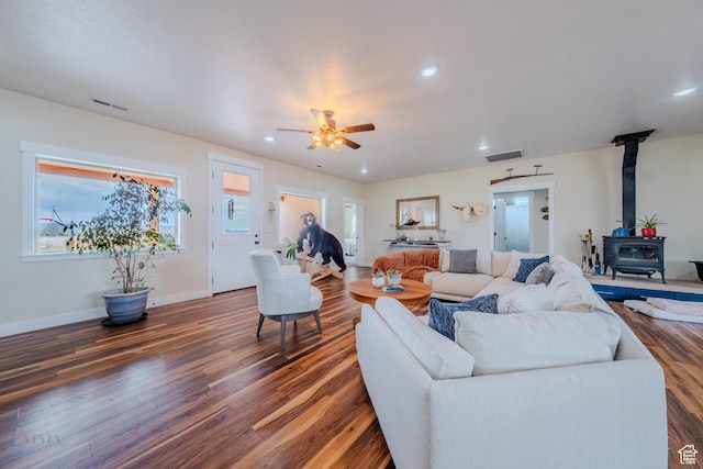 7395 N Johnson Canyon Rd, Kanab, UT 84741 - living area with a wood stove, wood finished floors, recessed lighting, ceiling fan, and plenty of natural light