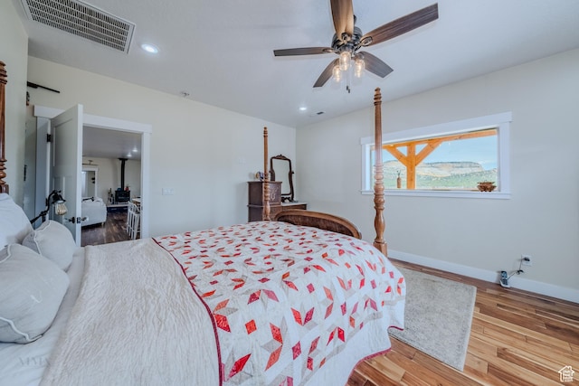 7395 N Johnson Canyon Rd, Kanab, UT 84741 - bedroom featuring wood finished floors, recessed lighting, and a ceiling fan