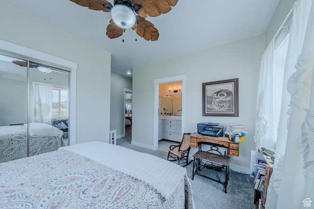 7395 N Johnson Canyon Rd, Kanab, UT 84741 - bedroom featuring light carpet, a closet, connected bathroom, and a ceiling fan