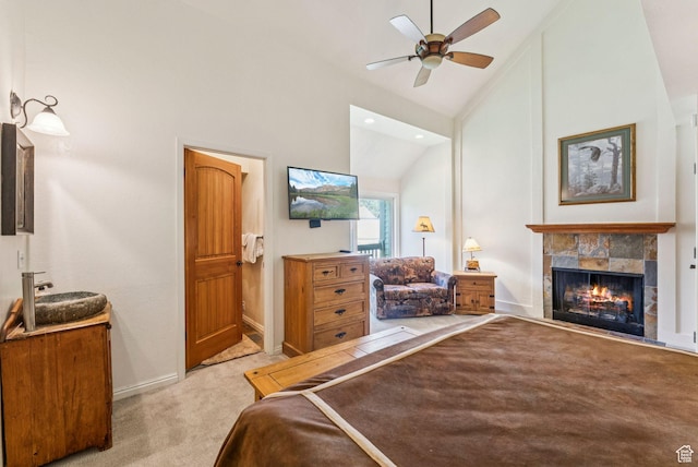 171 Dunlop Ct, Park City, UT 84060 - bedroom with lofted ceiling, light colored carpet, a tiled fireplace, recessed lighting, and ceiling fan
