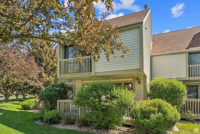 171 Dunlop Ct, Park City, UT 84060 - back of house with a balcony, a yard, and a shingled roof