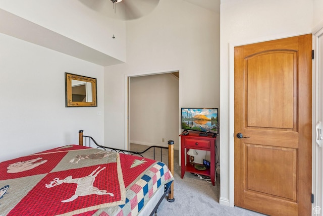 171 Dunlop Ct, Park City, UT 84060 - bedroom with light carpet, a towering ceiling, a ceiling fan, and a closet