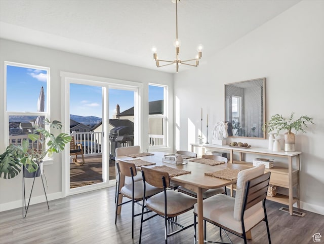 2297 N 250 W, Tooele, UT 84074 - dining space featuring a chandelier and wood finished floors