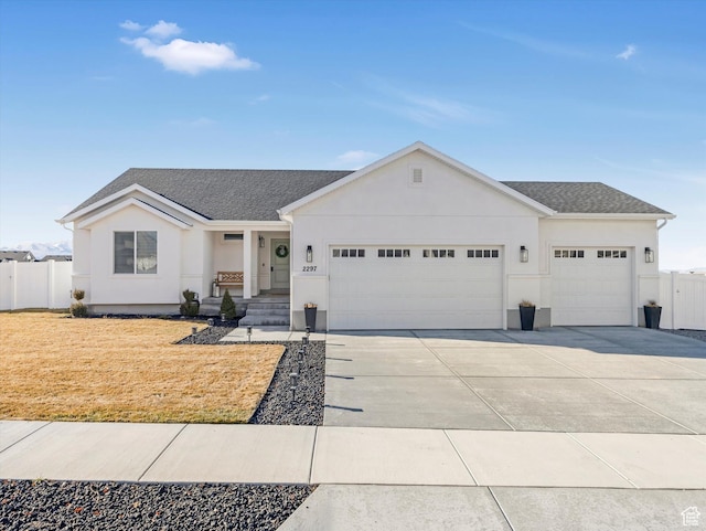 2297 N 250 W, Tooele, UT 84074 - ranch-style house with a garage, driveway, stucco siding, and roof with shingles