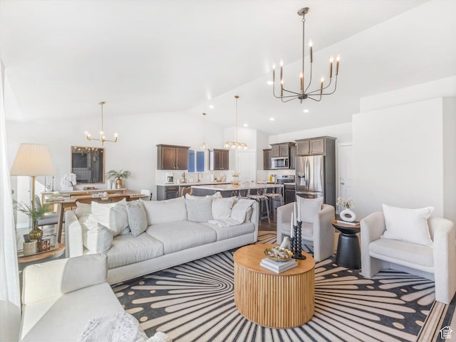 2297 N 250 W, Tooele, UT 84074 - living room with a chandelier, lofted ceiling, and recessed lighting