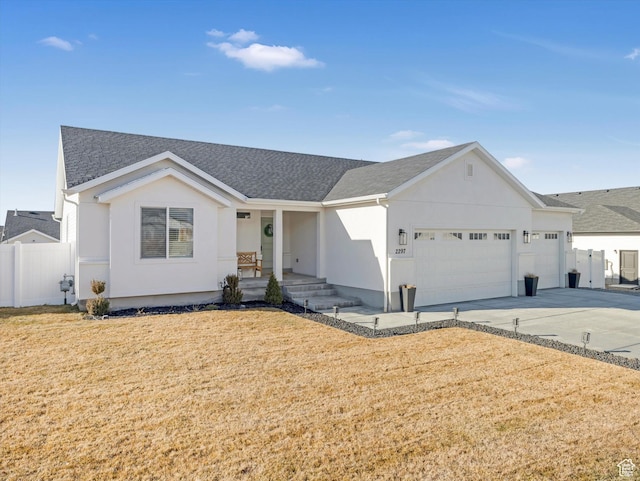 2297 N 250 W, Tooele, UT 84074 - ranch-style house with covered porch, a garage, a shingled roof, concrete driveway, and stucco siding