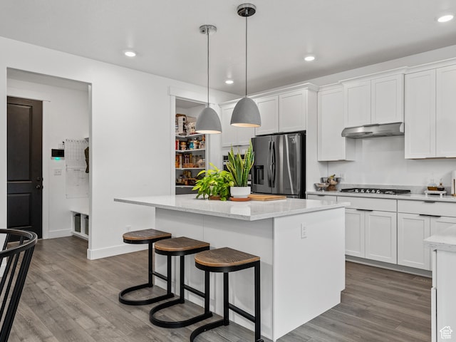 627 S Meade St, Mapleton, UT 84664 - kitchen featuring stainless steel appliances, a center island, dark wood-style floors, white cabinetry, and recessed lighting
