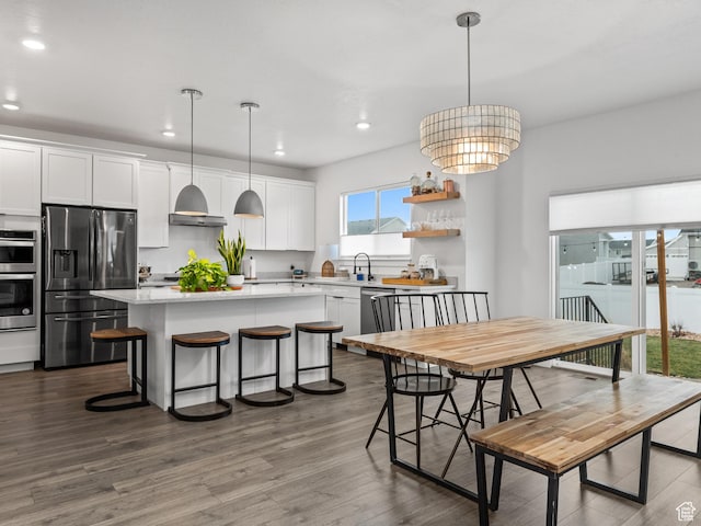 627 S Meade St, Mapleton, UT 84664 - dining space with recessed lighting and dark wood-style flooring