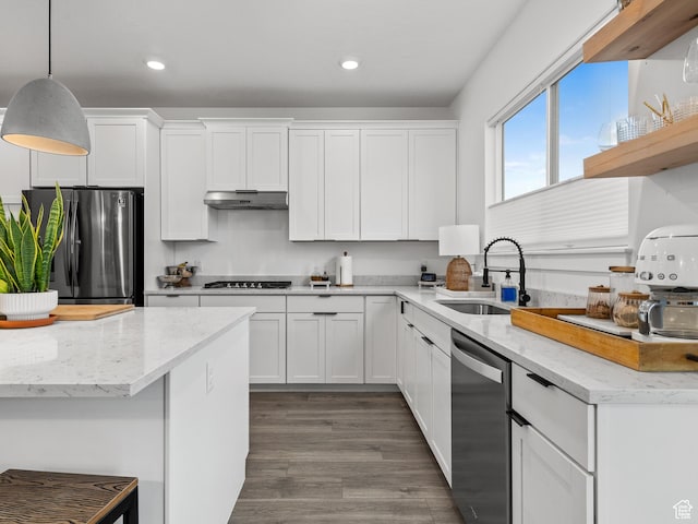 627 S Meade St, Mapleton, UT 84664 - kitchen featuring freestanding refrigerator, stainless steel dishwasher, under cabinet range hood, gas cooktop, and white cabinetry