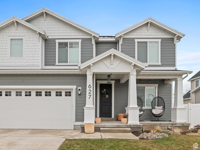 627 S Meade St, Mapleton, UT 84664 - craftsman inspired home with covered porch, an attached garage, and concrete driveway