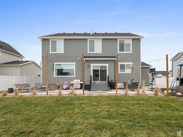627 S Meade St, Mapleton, UT 84664 - back of property with outdoor lounge area, a patio area, and stucco siding
