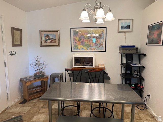 580 E Main St, Myton, UT 84052 - dining space with a chandelier and baseboards