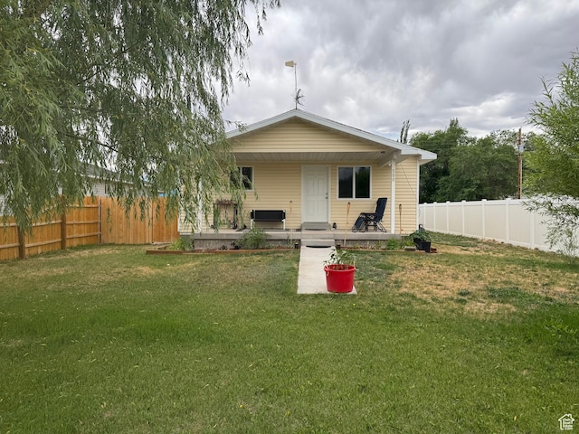 580 E Main St, Myton, UT 84052 - rear view of house with a fenced backyard