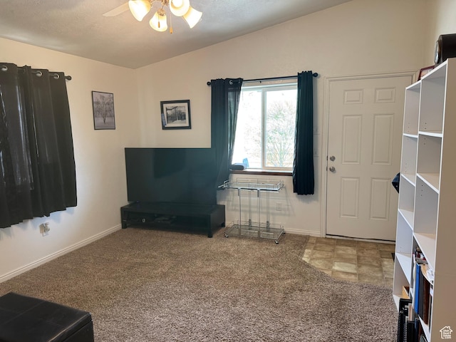 580 E Main St, Myton, UT 84052 - carpeted living room with ceiling fan and baseboards
