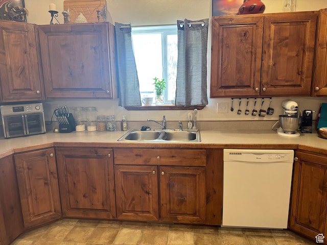 580 E Main St, Myton, UT 84052 - kitchen featuring dishwasher and light countertops
