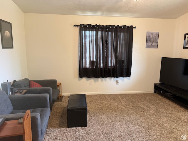 580 E Main St, Myton, UT 84052 - carpeted living area featuring baseboards