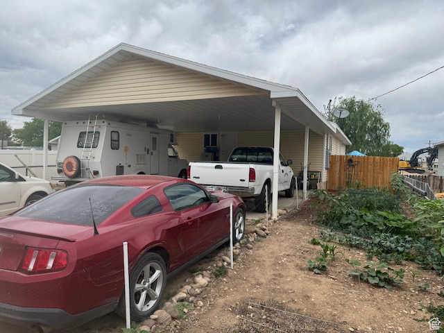 580 E Main St, Myton, UT 84052 - view of property exterior featuring a carport and driveway