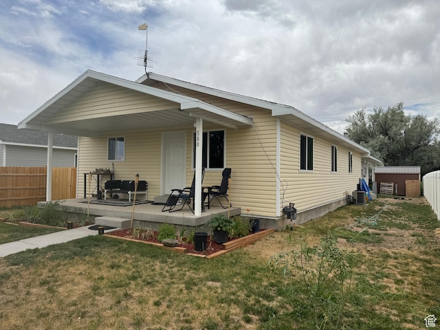 580 E Main St, Myton, UT 84052 - rear view of property with a shed