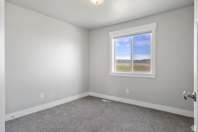 18605 N 6000 W, Riverside, UT 84334 - empty room with carpet and baseboards