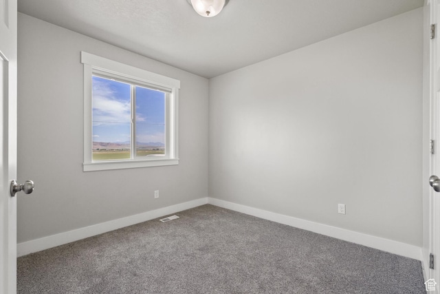 18605 N 6000 W, Riverside, UT 84334 - carpeted empty room with baseboards