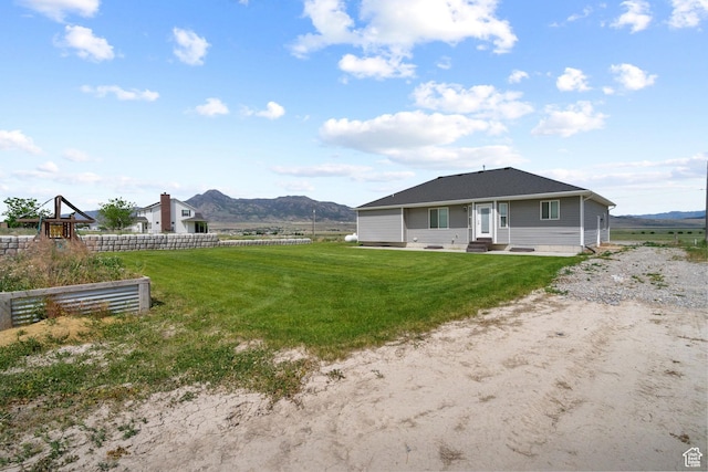 18605 N 6000 W, Riverside, UT 84334 - rear view of property featuring entry steps and a mountain view