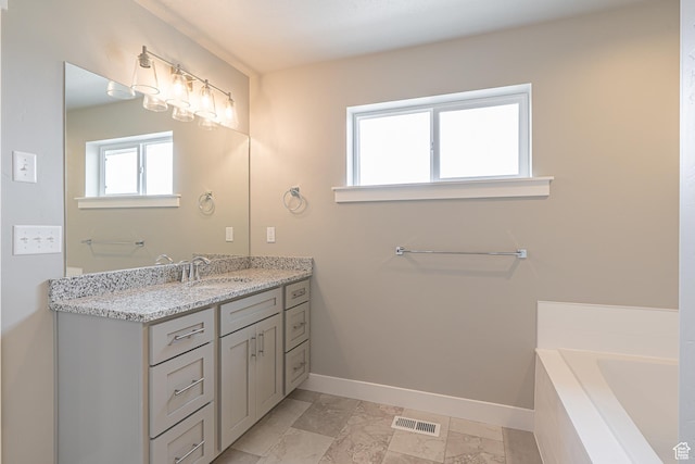 2202 S 1120 W Unit 64, Nibley, UT 84321 - bathroom with vanity and a bath